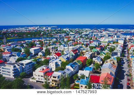 Beautiful Super Wide-angle Aerial View Of Reykjavik, Iceland With Harbor And Skyline Mountains And S