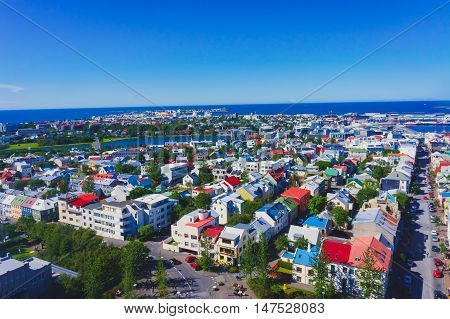 Beautiful Super Wide-angle Aerial View Of Reykjavik, Iceland With Harbor And Skyline Mountains And S