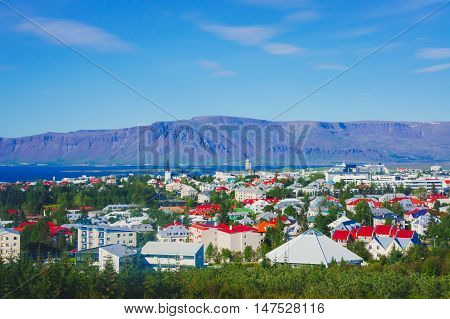 Beautiful Super Wide-angle Aerial View Of Reykjavik, Iceland With Harbor And Skyline Mountains And S