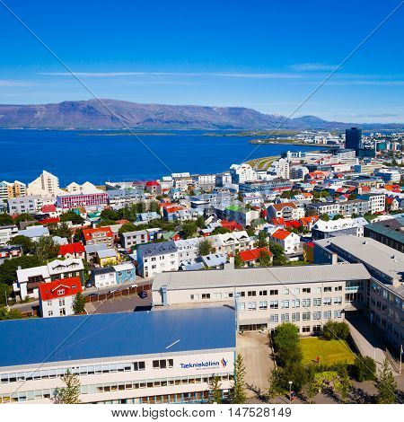 Beautiful Super Wide-angle Aerial View Of Reykjavik, Iceland With Harbor And Skyline Mountains And S