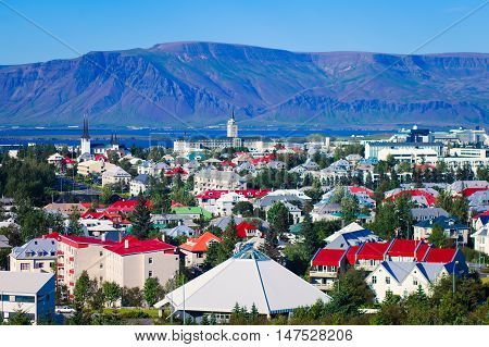 Beautiful Super Wide-angle Aerial View Of Reykjavik, Iceland With Harbor And Skyline Mountains And S