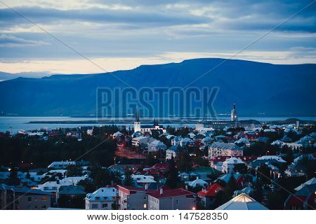 Beautiful Super Wide-angle Aerial View Of Reykjavik, Iceland With Harbor And Skyline Mountains And S