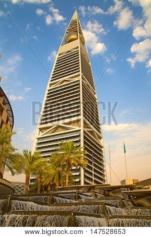 RIYADH - AUGUST 22: Sunset light at Al Faisaliah tower facade on August 22, 2016 in Riyadh, Saudi Arabia. Al Faisaliah towers is a luxury hotel and the most distinctive skyscraper in Saudi Arabia