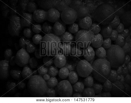 Dark grey beaded marble bulb bead balls pellet abstract background