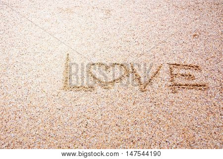 love message written in sand Sign Love on sand on beach