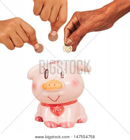 concept save moneyhand elderly and girl with pink piggy pank isolate background
