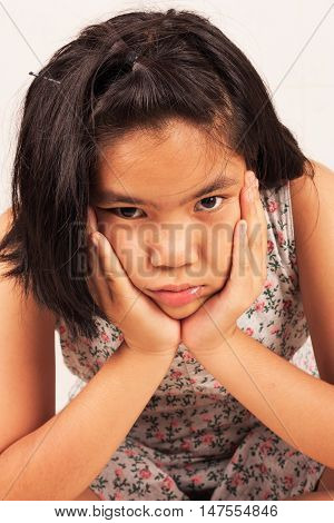 portrait of cute girl sad and morose