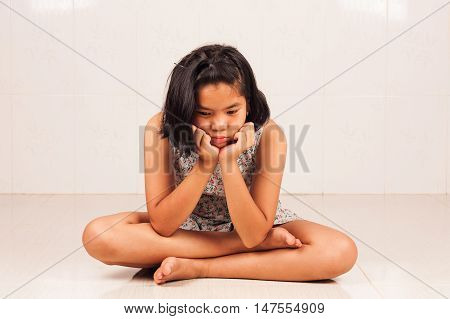 portrait of cute girl sad and morose