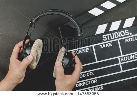 Handle headphone on a slate black background