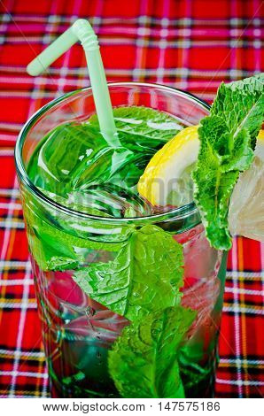 beautifull decorated motijo with ice apple lime and mint is served in the bar restaurant club