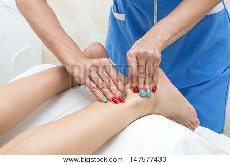 the process of foot massage treatments in the beauty salon