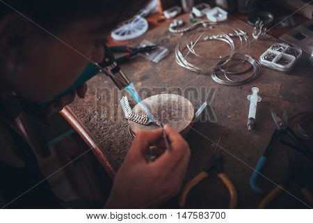Desktop for craft jewellery making with professional tools.