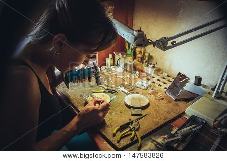 Desktop for craft jewellery making with professional tools.