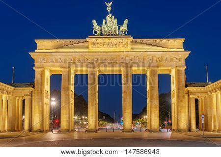 The famous Brandenburg Gate in Berlin illuminated at night