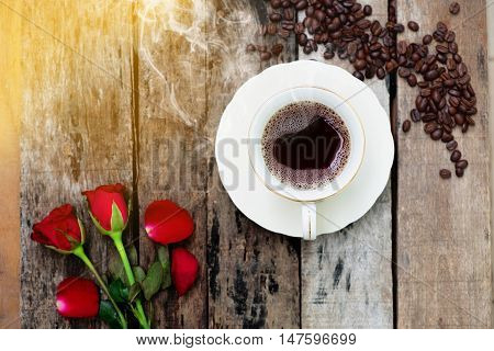 Coffee cup in Morning on old wood background