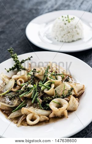 fresh squid and kampot green pepper stir fry traditional asian cambodian seafood meal