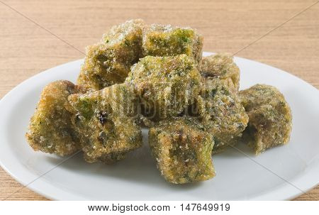 Plate of Fried Chinese Pancake or Fried Steamed Dumpling Made of Garlic Chives Rice Flour and Tapioca Flour. Traditional Food of China.