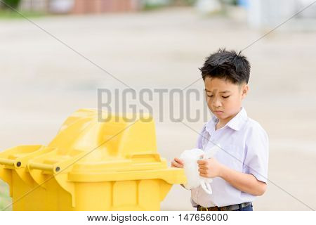Boy Trow The Garbage