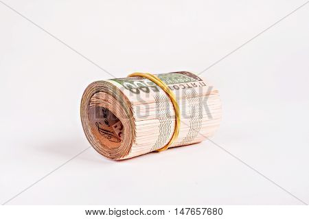 a pack of 500 hryvnia rolled isolated.