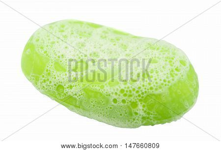 green soap with foam on a white background