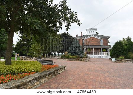 GENEVA, ILLINOIS - SEPTEMBER 9, 2016: History Gallery and Gift Shop and Key Garden at the Peck Farm Park Interpretative Center, a 385 acre natural retreat.