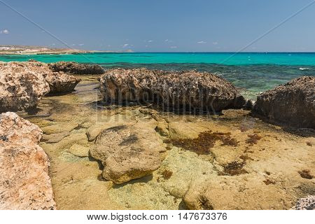 rocky coast of the azure mediterranean sea