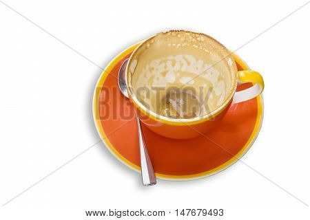 Empty orange mug of coffee latte isolated on white background