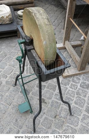An old grindstone tool to sharpen knives scalpels and other ferrous tools