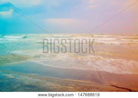 multi-colored seascape in soft-focus image combine with long exposure