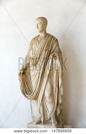 ROME, ITALY - JUNE 12, 2015: Ancient statue of man in baths of Diocletian (Thermae Diocletiani) in Rome. Italy