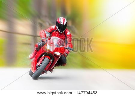 Dynamic and realistic motorbike racing on bright summer background