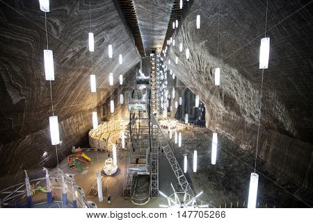 TURDA, ROMANIA - SEPTEMBER 15, 2016. Underground salt mine in Turda ,popular attraction for many tourists,Transylvania, Romania.
