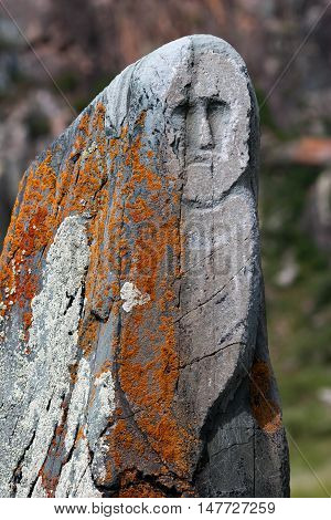 Ancient stone statue on the site Kalbak-Tash in the Altai Mountains Russia