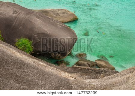beautiful blue transparently sea waves stones view