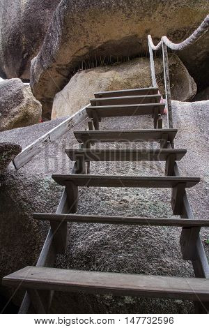 Wooden steps rail in Thai country, Thailand