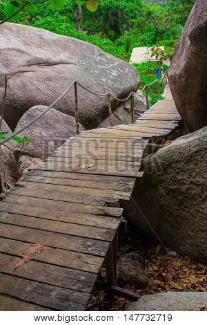 Wooden steps rail in Thai country, Thailand