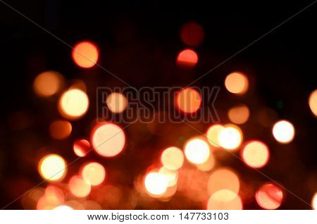 Bright christmas eve background. Plenty of golden sparkling bokeh from defocused garland lights. Backdrop for design
