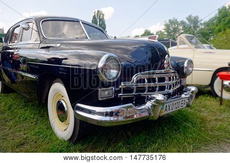 Kharkiv Ukraine - May 22 2016: Soviet retro car black GAZ-12 (ZIM) manufactured between 1949 and 1959 is presented at the festival of vintage cars Kharkiv Retro Rally - 2016 in Kharkiv Ukraine on May 22 2016