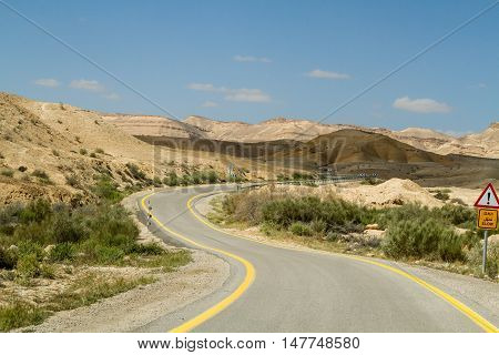 Road in Makhtesh Gadol or Large Crater, nature reserve in Negev desert, Israel
