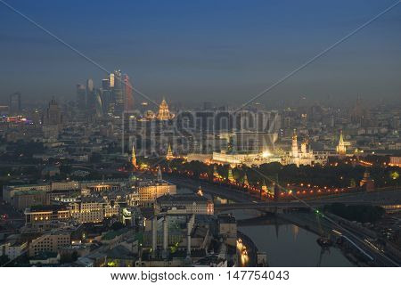 Big Moskvoretsky Bridge, river, Kremlin with illumination in Moscow, Russia, view from Stalin skyscraper on Kotelnicheskaya quay