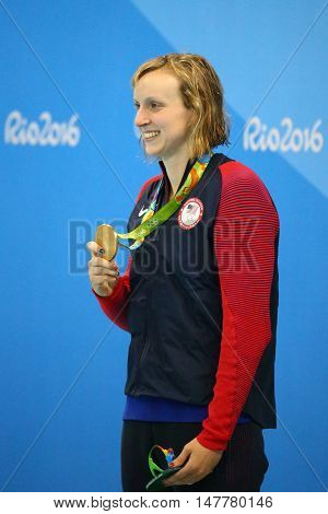 RIO DE JANEIRO, BRAZIL - AUGUST 12, 2016: Olympic champion Katie Ledecky of United States during medal ceremony after victory at the Women's 800m freestyle of the Rio 2016 Olympic Games