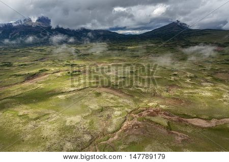 Uzon Caldera in Kronotsky Nature Reserve on Kamchatka Peninsula. View from helicopter.