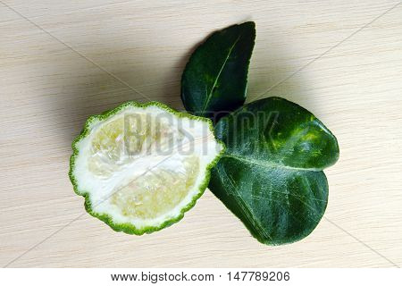 Bergamot Fruit With Leaf On Wooden Board