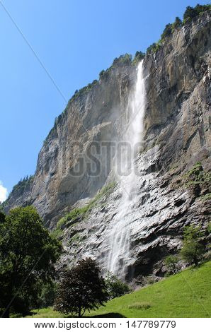 View of the spectacular 300m Staubbach Waterfall in Lauterbrunnen, in the Bernese Oberland in Switzerland.