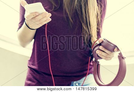 Young Woman Listening Music Concept
