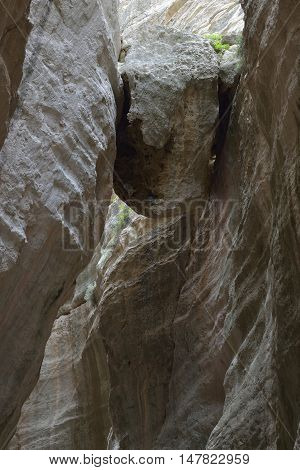 Large Boulder wedged in Avakas Gorge West side of Akamas Peninsula Cyprus