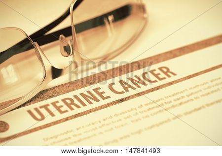 Uterine Cancer - Printed Diagnosis with Blurred Text on orange Background with Spectacles. Medicine Concept. 3D Rendering.