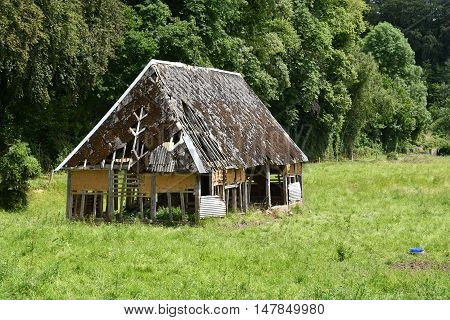 cailly France - june 23 2016 : an old barn in a meadow