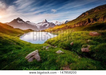 Panorama of Mt. Schreckhorn and Wetterhorn above Bachalpsee lake. Dramatic and picturesque scene. Location place Swiss alps, Bernese Oberland, Grindelwald, Europe. Soft filter effect. Beauty world.