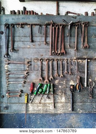 Workshop scene. Tools on the table and board.